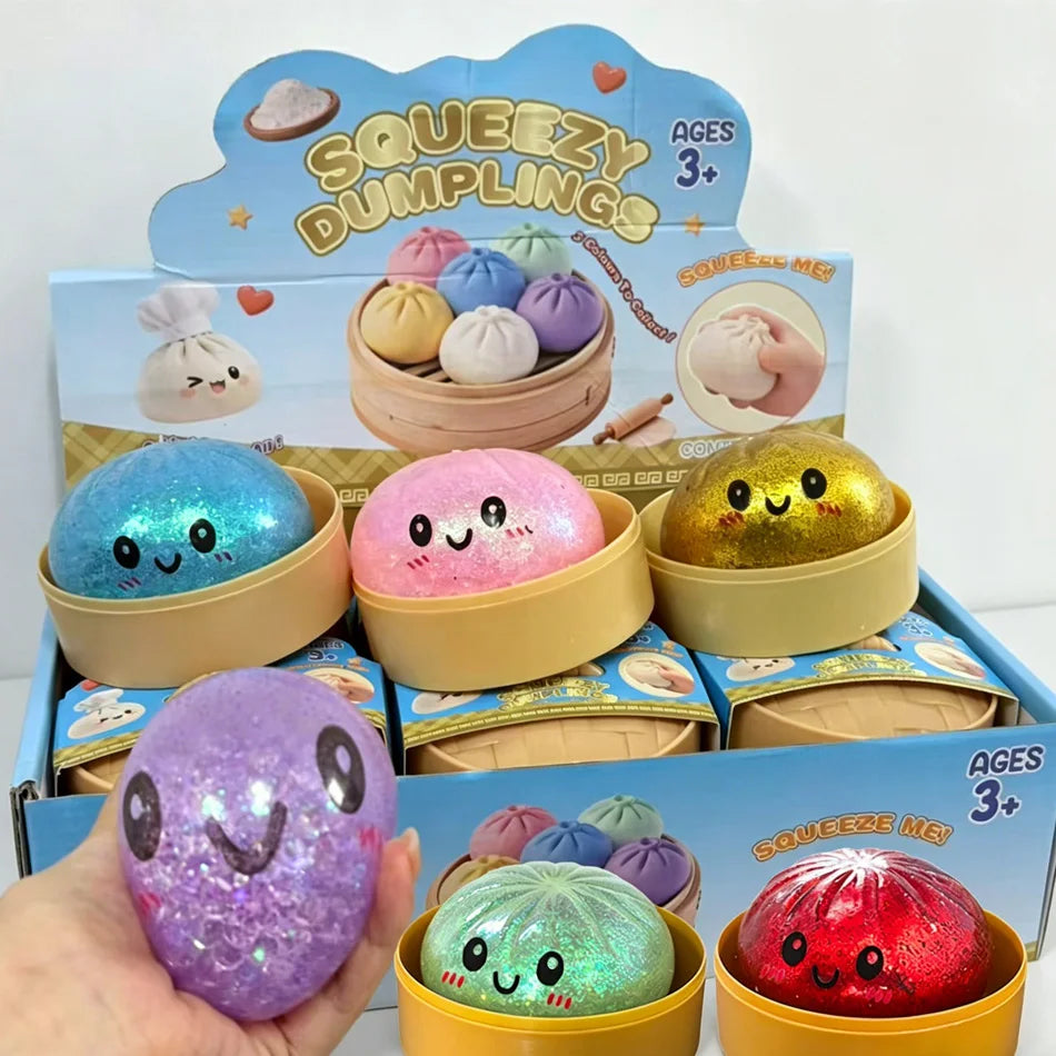 Nouveau lot de 1 à 12 pièces de jouets sensoriels anti-stress en forme de dumpling scintillant avec boîte