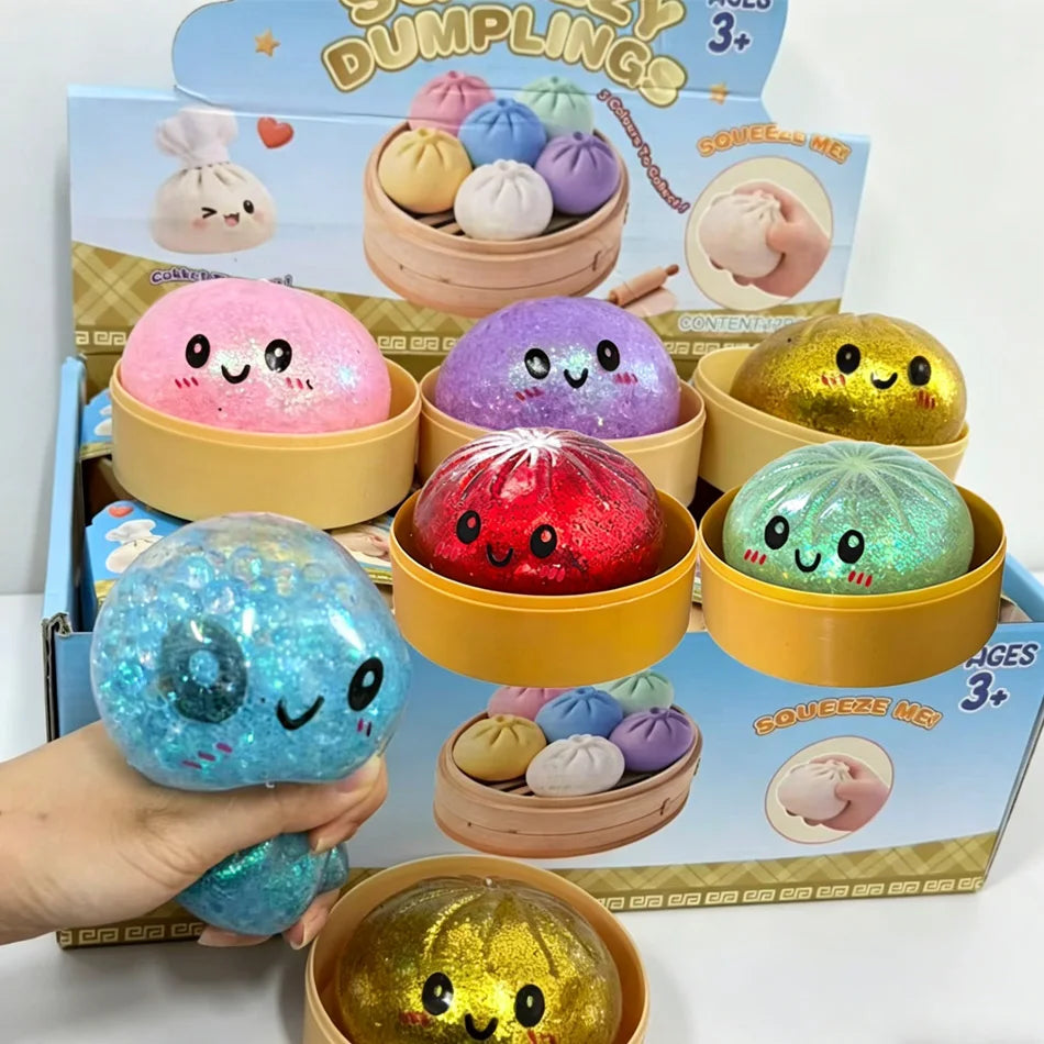 Nouveau lot de 1 à 12 pièces de jouets sensoriels anti-stress en forme de dumpling scintillant avec boîte